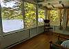 Enclosed porch overlooking the lake