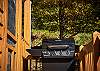 A gas grill is just off the screened in porch for your grilling pleasure.
