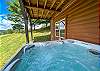 Relax in the bubbling hot tub while enjoy beautiful views from this vacation rental. 