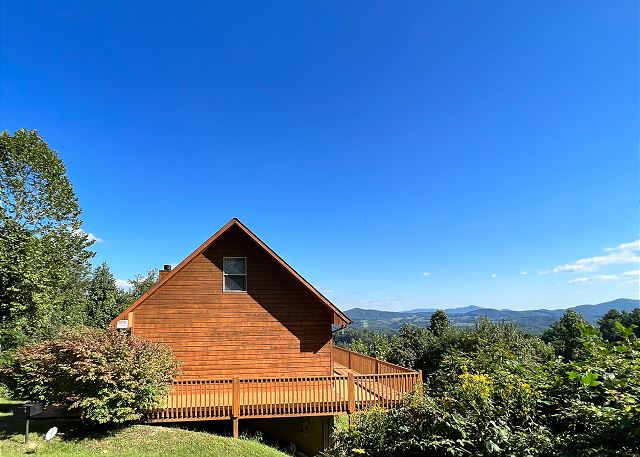 Enjoy long range mountain views from the wraparound deck at Above It All. 