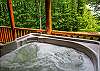 A bubbling hot tub and mountain views await you! 