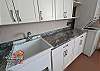 Located in Garage, with utility sink