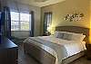 King bed in the second story ensuite bath bedroom. 