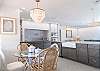 Dining table in kitchen overlooking the front deck