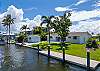 Canal side to the large back yard. 