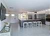 Large living area into a huge kitchen