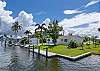 Canal view showing the large lot size and the dockage for you boat or a boat rented from the local marina. 