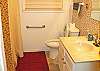 Hallway full bath with handicap accessible shower