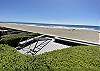 ladder to access beach over wall