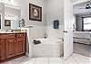 Master Bathroom with shower and separate soaking tub.