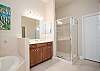 Master Bathroom Features Soaking Tub and separate Shower. 