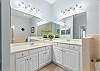 Ensuite features with double vanities, soaking tub and separate shower. 