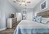 King Master Suite with Sliding Glass door out to the Balcony!