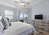 King Master Suite with Sliding Glass door out to the Balcony!