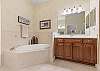 Master Bath features Soaking Tub and Separate Shower and Dual Vanities. 