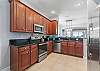 Kitchen is open to the main living area and view. 