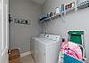 The laundry room is a great space to store your beach accessories during your stay.