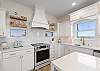 Cook up your favorite meals in this elegant kitchen. 