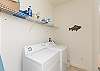 The laundry room is a great space to store your beach accessories during your stay.