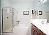 Master Bathroom with Soaking Tub and Separate Shower.