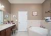 Master Bathroom features, separate shower and soaking tub.