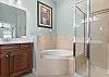 Primary King Ensuite with soaking tub and separate shower.