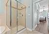 Primary King Ensuite with soaking tub and separate shower.