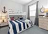 The 3rd nautical bedroom showcases a Bunk bed with a Trundle bed.