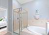 Primary Bathroom features Soaking Tub, Separate Shower and Dual Vanities.