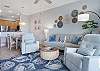 Enjoy the Coastal Feel of the living room with views of the golf course and ocean. 