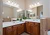 Master Bathroom with double vanity, soaking tub and separate shower. 