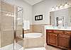 King Master Bath With Step-in Shower And Soaking Tub