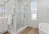 3rd Floor King Master Ensuite with separate shower, soaking tub and double vanities. 