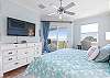 King Master Suite features amazing Views of the Ocean and the TV.