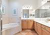 Master Ensuite with Double Vanity, shower and separate soaking tub.