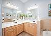 Master Bathroom features double vanities, shower and separate soaking tub. 