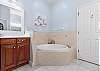 King Ensuite with dual vanity, soaking tub and separate shower!