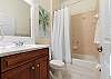 Queen Ensuite with Shower/Tub combo.