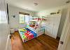 This 2nd Level Bedroom features a Twin over Full Bunk with Trundle and TV.