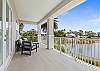 2nd Floor Balcony Overlooking the Pool and lake.