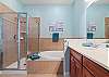 King Master Ensuite with soaking tub and separate shower.