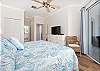 King Master Suite with access to the balcony.