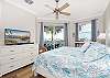 King Master Suite with access to the balcony.