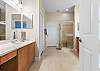 Master Ensuite with Dual Vanities, Soaking Tub and Separate Shower.