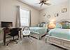 3rd Bedroom features 2 Full Beds and Desk with 3rd Bathroom next door.