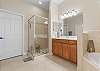 Master Ensuite with Dual Vanities, Soaking Tub and Separate Shower.