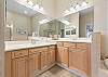 King Master Ensuite with soaking tub, separate shower and double vanity.