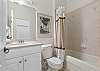 2nd Full bathroom located near guest bedrooms. Shower/Tub combo