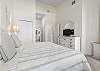 King Primary suite with sliding glass door to the Oceanfront Balcony!