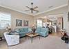 Living Room features ocean blues that highlight the beach vibes.